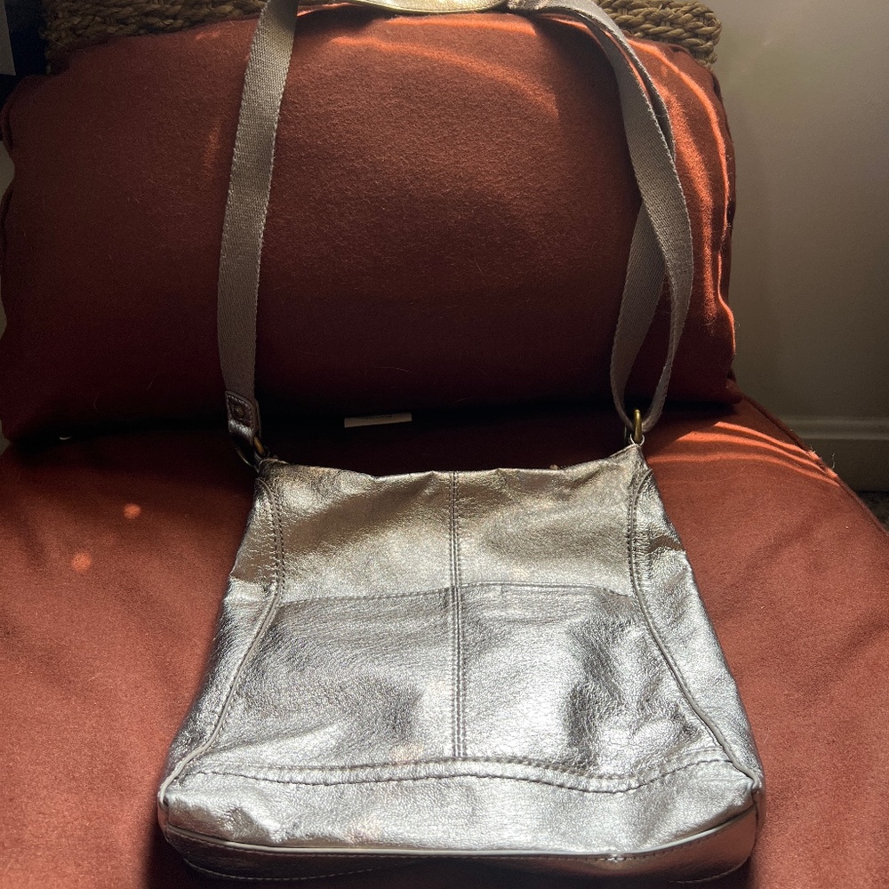 The Sak gold cross body bag